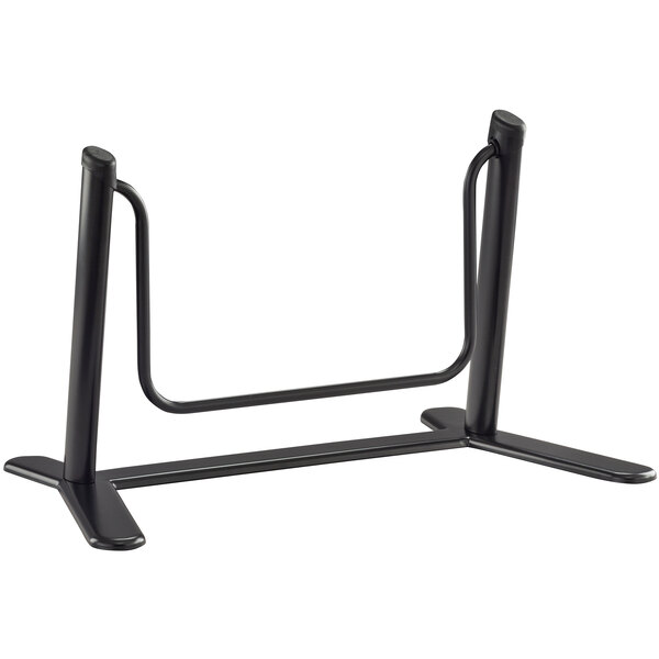 A black metal Safco footrest with a swing bar.