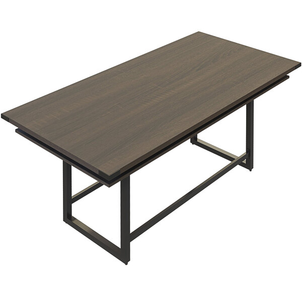 A brown rectangular Safco Mirella standing conference table with metal legs.
