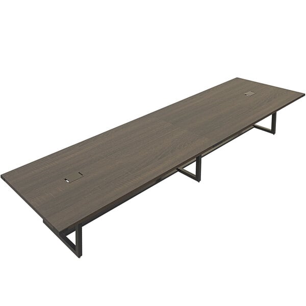 A Safco Mirella rectangular conference table in Southern Tobacco with a black base.