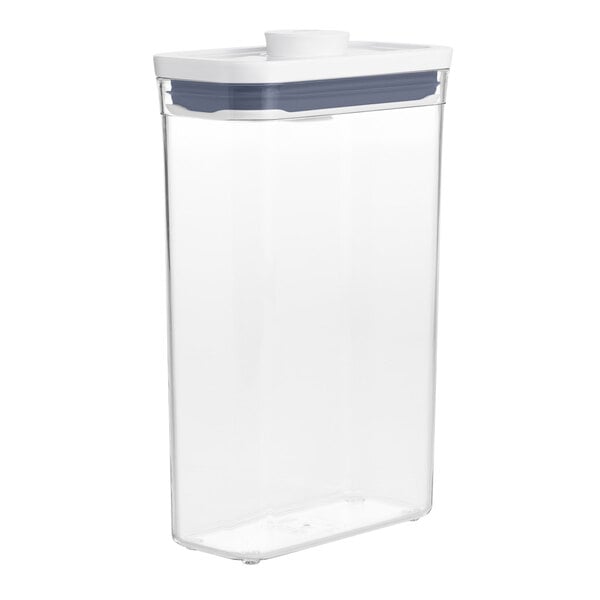 An OXO Good Grips clear rectangular plastic food storage container with a white lid.