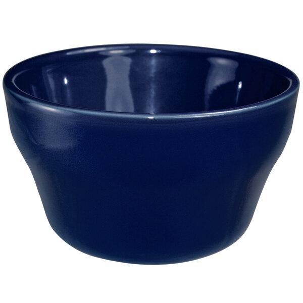 A cobalt blue stoneware bouillon bowl.
