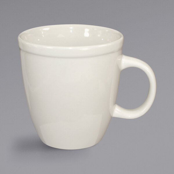 An International Tableware ivory stoneware mocha mug with a handle.