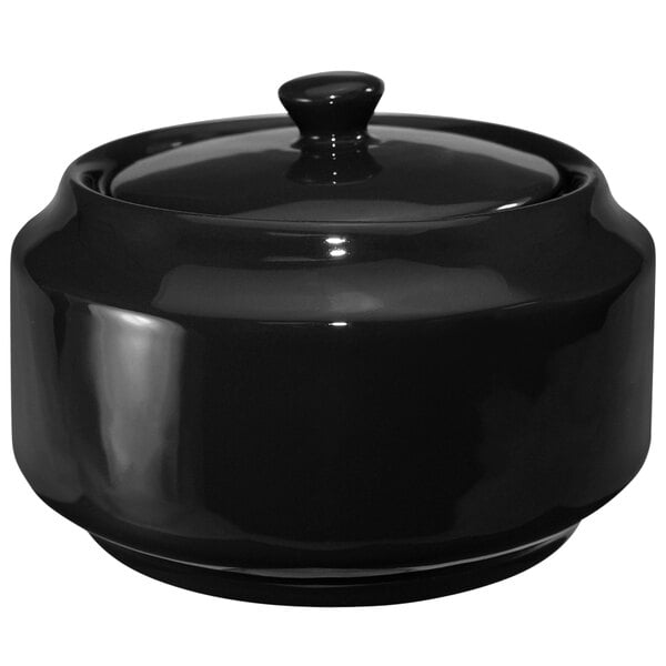 A black ceramic pot with a lid.