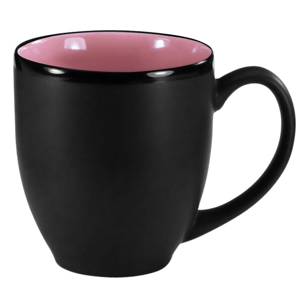A black and pink International Tableware stoneware bistro cup with a handle.