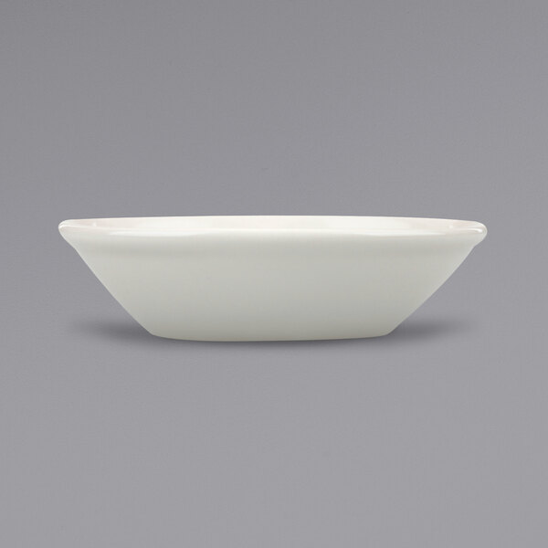 A close up of a International Tableware Roma Ivory Stoneware Bowl.
