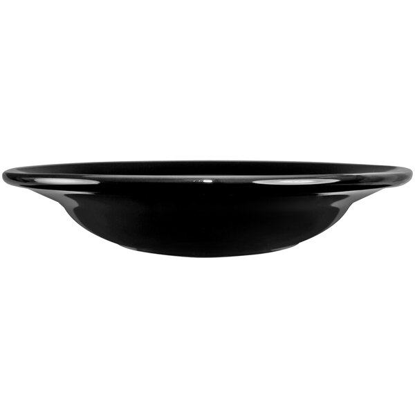 A close-up of a black International Tableware Cancun stoneware bowl.