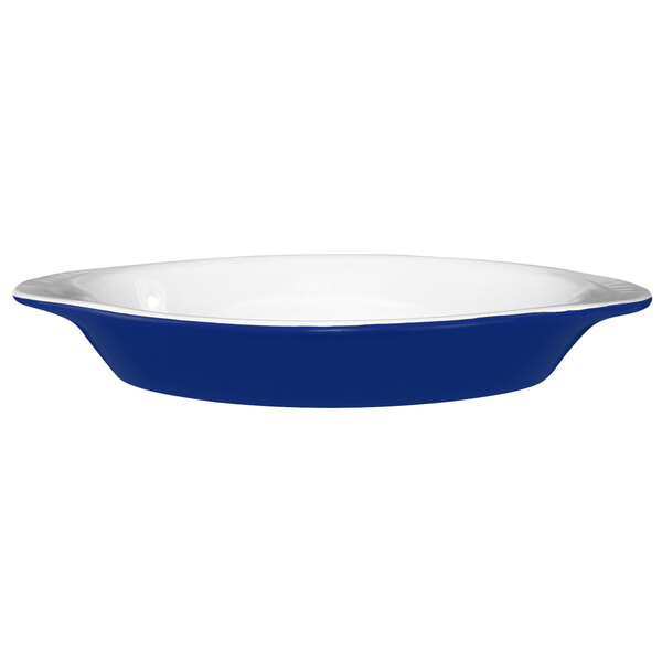 An International Tableware cobalt blue and white rarebit dish with black lines on the white background.