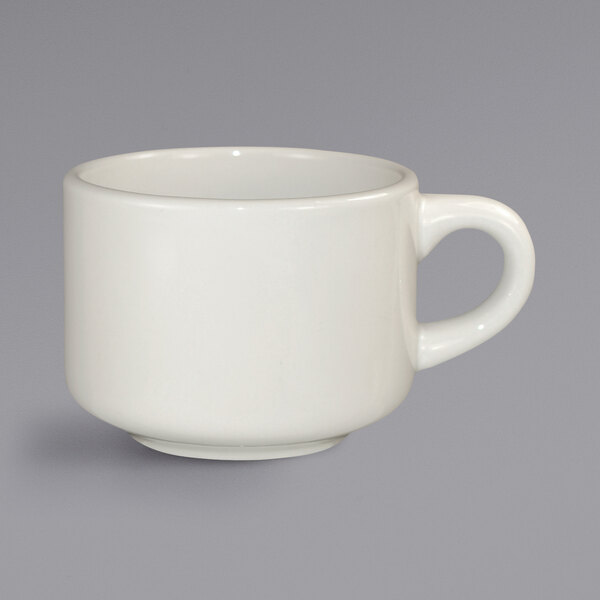A white International Tableware Roma cup with a rolled edge and handle.