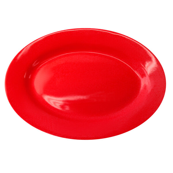 A crimson red stoneware platter with a wide rim.