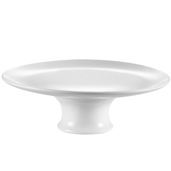 A white CAC China cake stand with a round base.