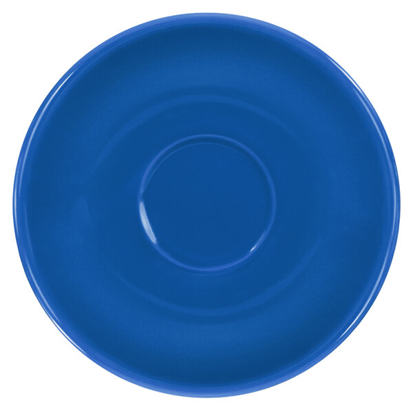 A close-up of a light blue International Tableware saucer with a circle in the middle.