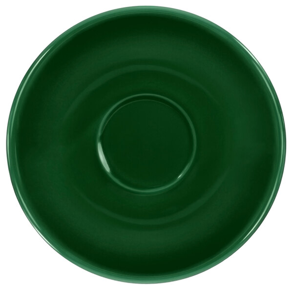 A green saucer with a circle in the middle.