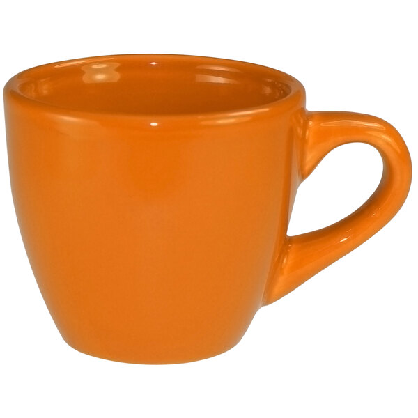An orange stoneware espresso cup with a handle.