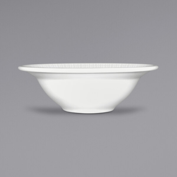 A white International Tableware porcelain bowl with a rim.