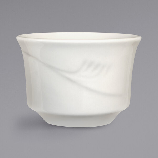 An International Tableware Newport ivory stoneware bowl with an embossed design.