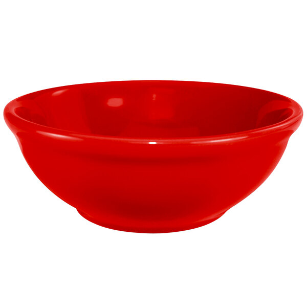 A crimson red International Tableware stoneware bowl.