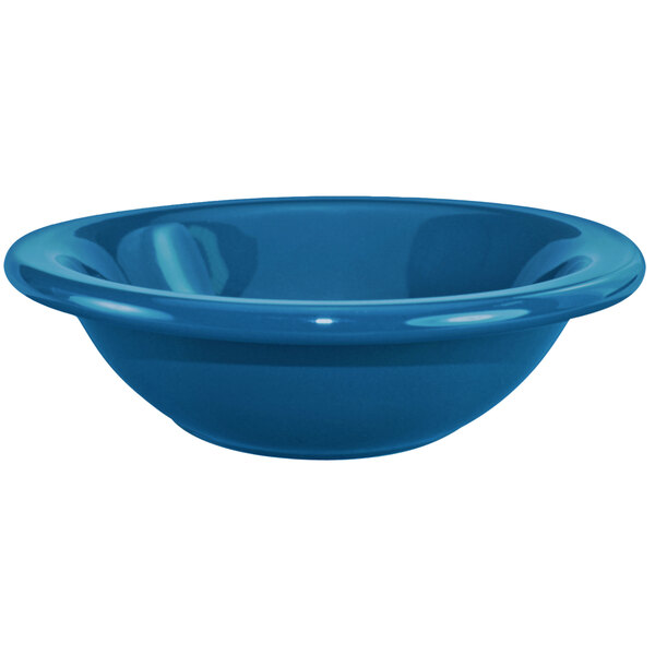 A light blue stoneware bowl with a rim.