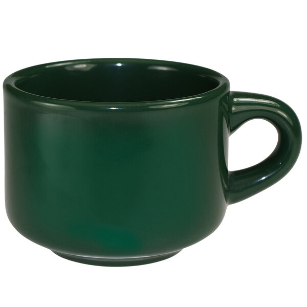 A green International Tableware stoneware coffee cup with a handle.