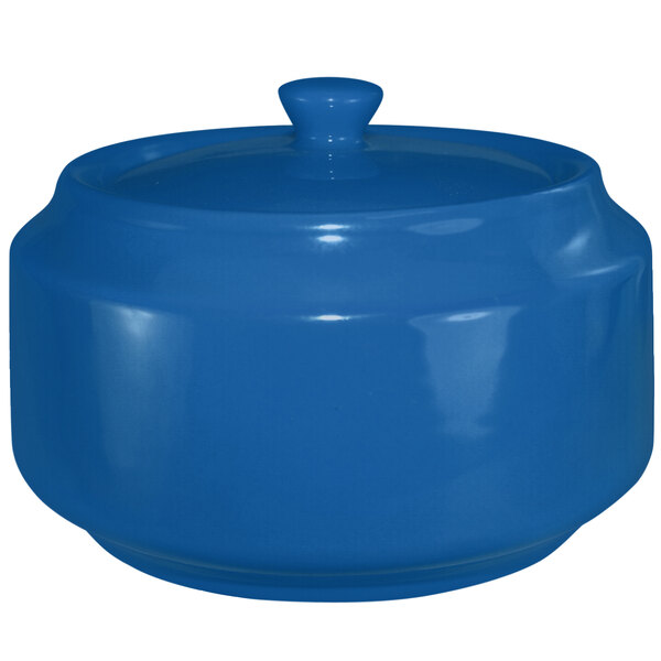 A light blue ceramic sugar bowl with lid.