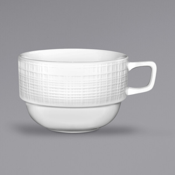 A white International Tableware porcelain espresso cup with a handle.