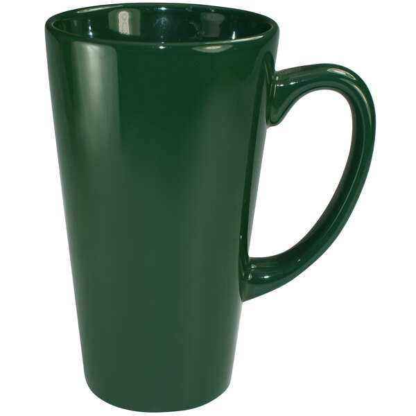 A green coffee mug with a handle.