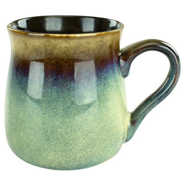 A tan stoneware tavern mug with a handle.