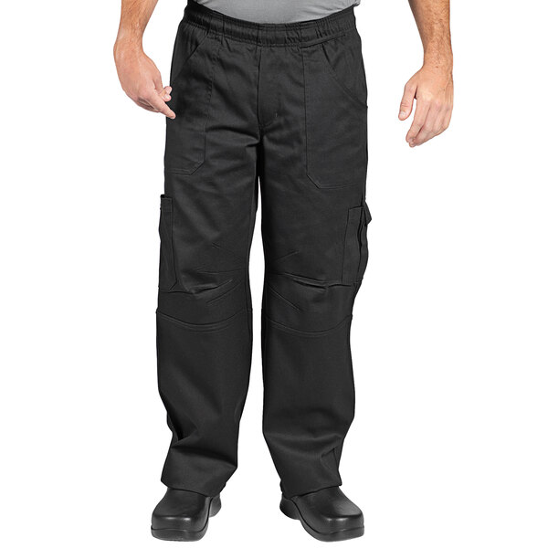 A person wearing Uncommon Chef black cargo chef pants.
