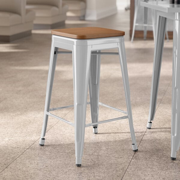 Lancaster Table & Seating Alloy Series Silver Indoor Backless Counter Height Stool with Walnut Wood Seat