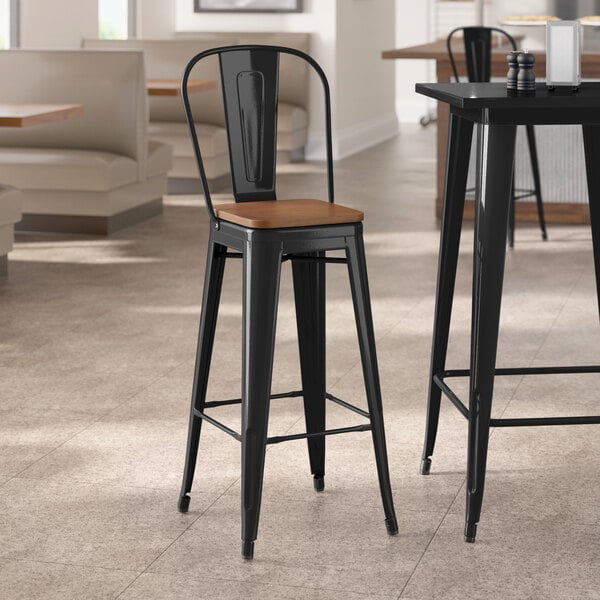 Lancaster Table & Seating Alloy Series Onyx Black Indoor Cafe Barstool with Walnut Wood Seat