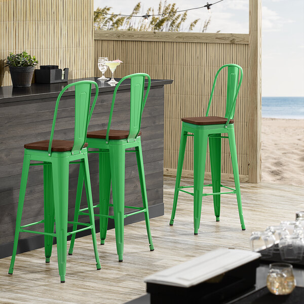 Lancaster Table & Seating Alloy Series Green Metal Indoor Industrial Cafe Bar Height Stool with Vertical Slat Back and Walnut Wood Seat