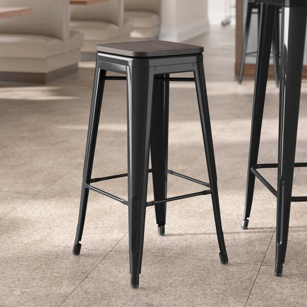Lancaster Table & Seating Alloy Series Onyx Black Indoor Backless Barstool with Black Wood Seat