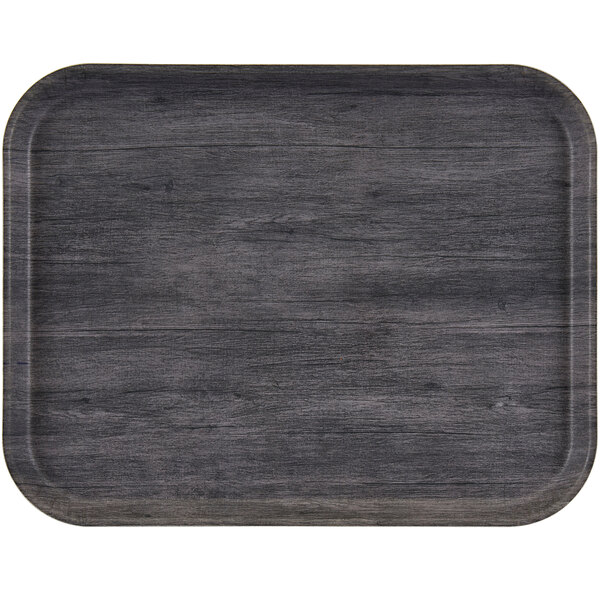 A black rectangular Cambro fiberglass tray on a table.