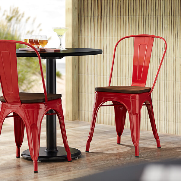 Lancaster Table & Seating Alloy Series Red Metal Indoor Industrial Cafe Chair with Vertical Slat Back and Walnut Wood Seat