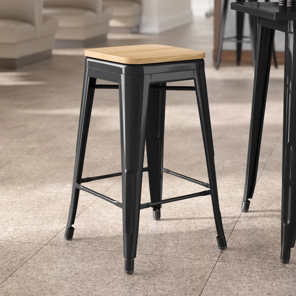 Lancaster Table & Seating Alloy Series Onyx Black Indoor Backless Counter Height Stool with Natural Wood Seat