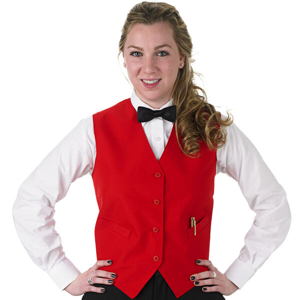 A woman in a red Henry Segal server vest and black bow tie.