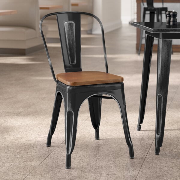 Lancaster Table & Seating Alloy Series Distressed Onyx Black Indoor Cafe Chair with Walnut Wood Seat