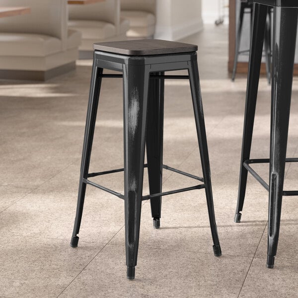 Lancaster Table & Seating Alloy Series Distressed Black Indoor Backless Barstool with Black Wood Seat