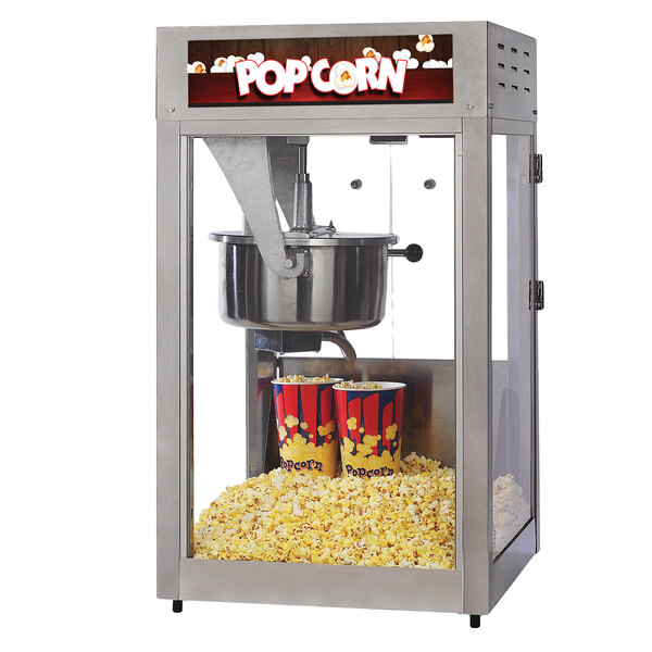 A Global Solutions by Nemco popcorn machine with two cups of popcorn.