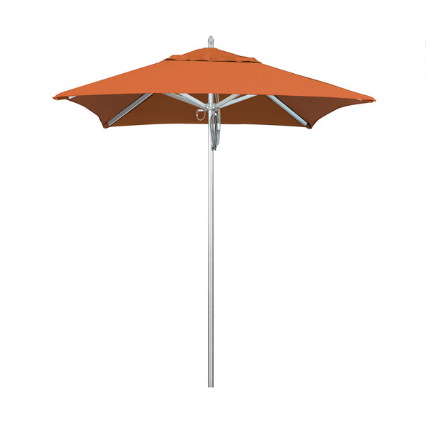 A California Umbrella with a Tuscan orange Sunbrella canopy on a metal pole.