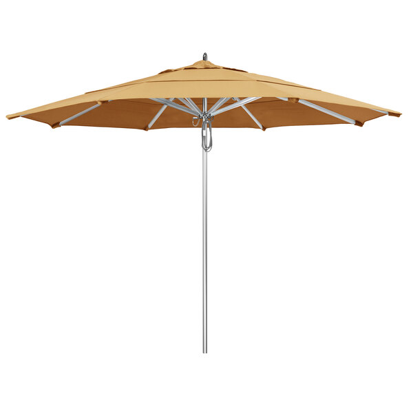 A close-up of a California Umbrella with a tan Sunbrella canopy and an aluminum pole.