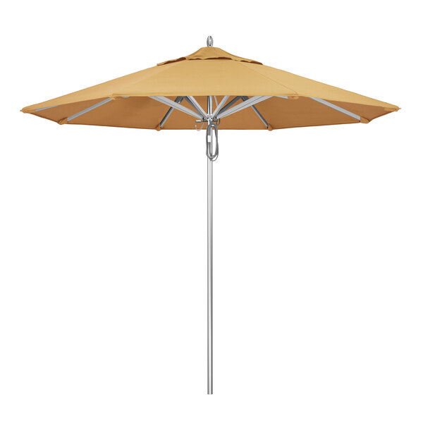 A California Umbrella with a wheat Sunbrella canopy on an aluminum pole.