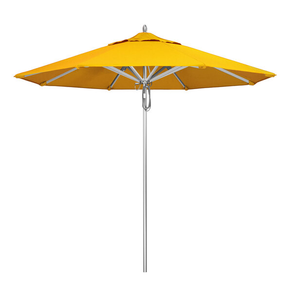 A California Umbrella with Sunflower Yellow Sunbrella Canopy on a Metal Pole.