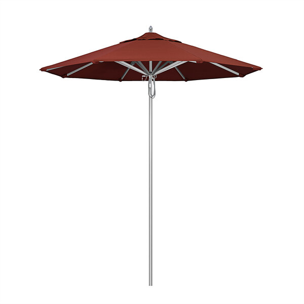 A California Umbrella with Sunbrella Henna fabric on a pole.