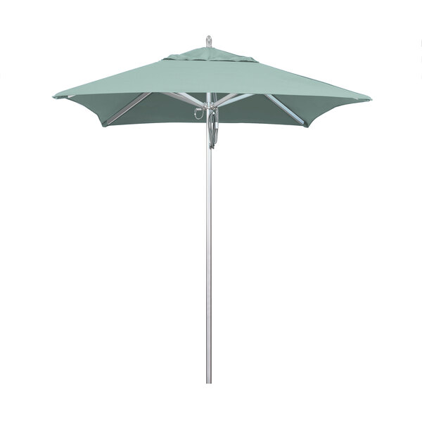 A close-up of a green California Umbrella on a metal pole.