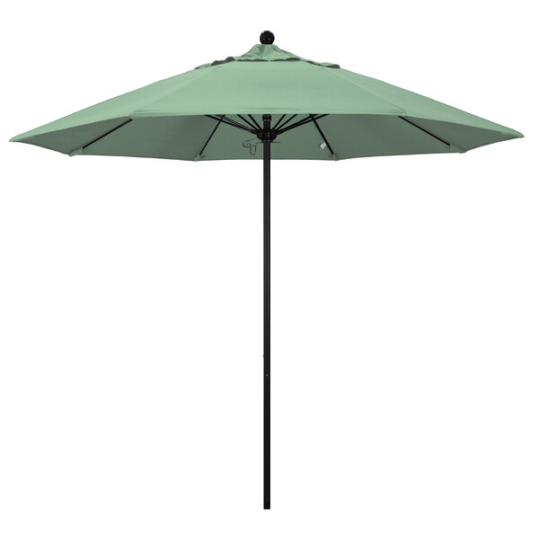 A green California Umbrella with a black pole on a white background.