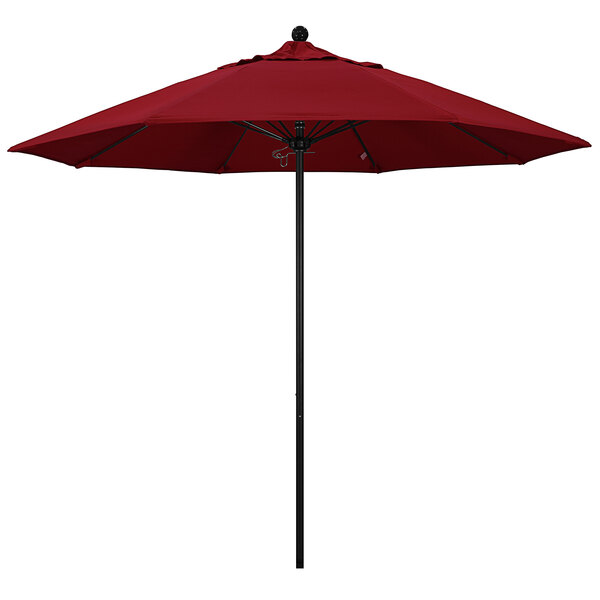 A close-up of a red California Umbrella on a black pole.
