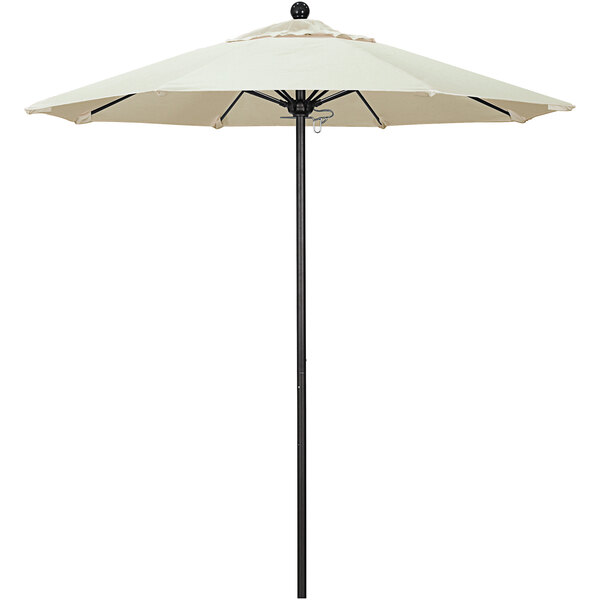 A California Umbrella with a Pacifica canopy on a white pole.