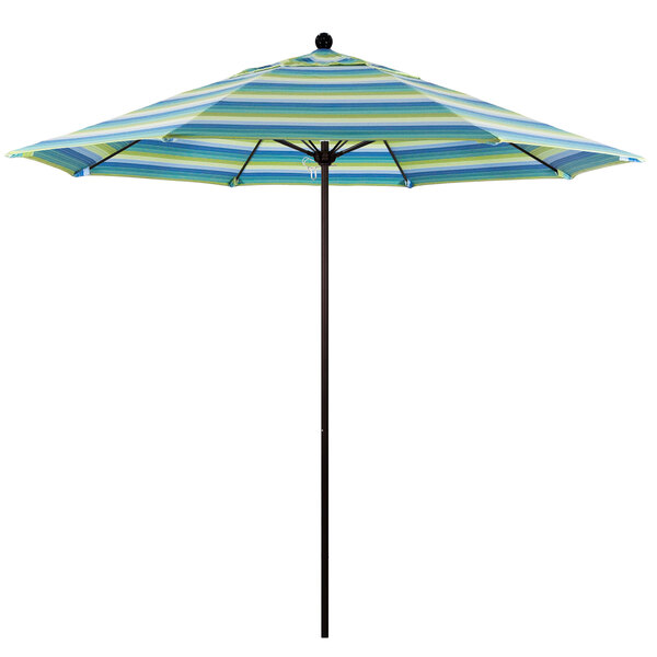 A blue, green, and yellow striped California Umbrella with a black pole.