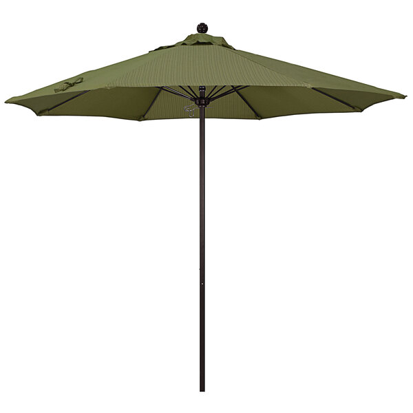 A green California Umbrella on a black pole.