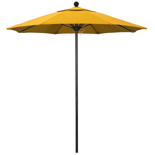 A close up of a California Umbrella with Sunflower Yellow Sunbrella canopy on a black pole.